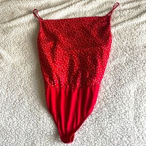 Red and white polka dot silky bodysuit
